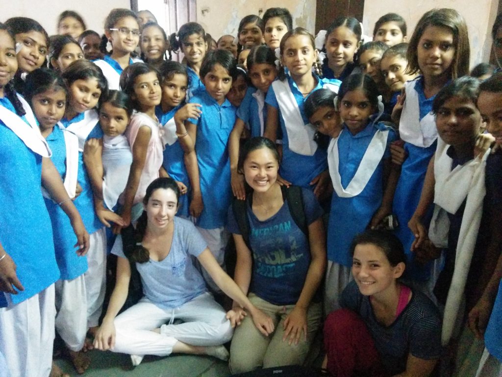 The girls with students from a nearby all-girls government school